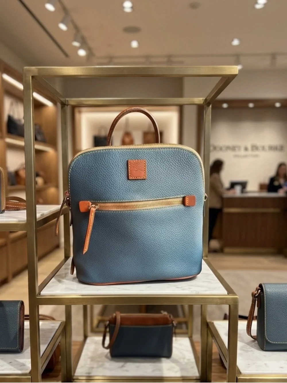 Dooney & Bourke Blue Leather Pebbled Grain Backpack with Tan Trim